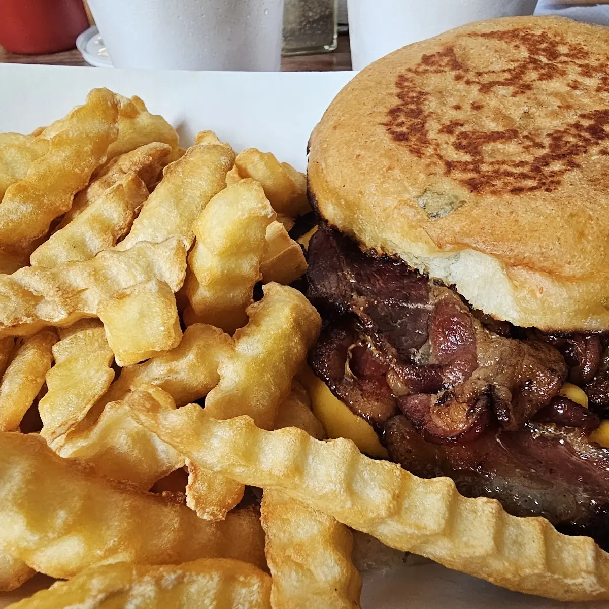 Bacon Cheeseburger with Fries on a Sourdough Bun