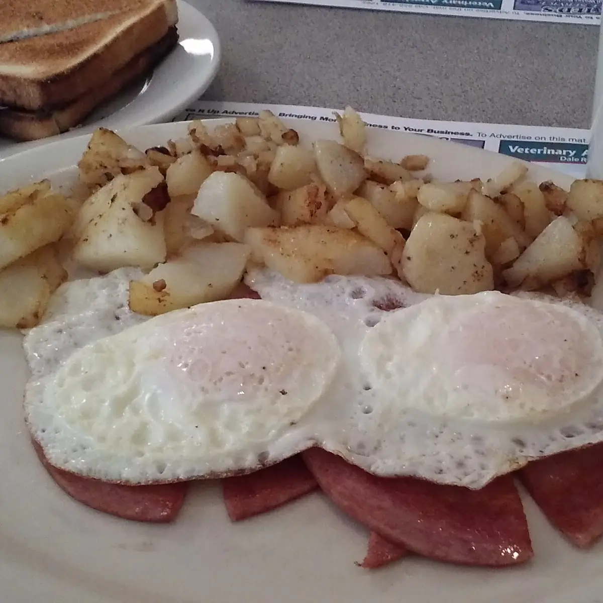 Two Eggs over Pork Roll Home Fries