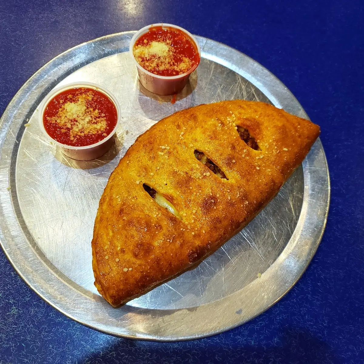 Sausage Calzone with Extra Tomato Sauce