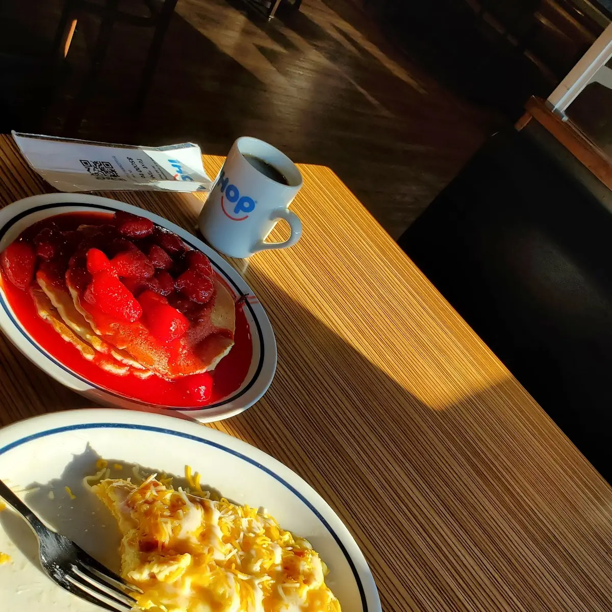 Ham and Cheese Omelette with Strawberries over Pancakes