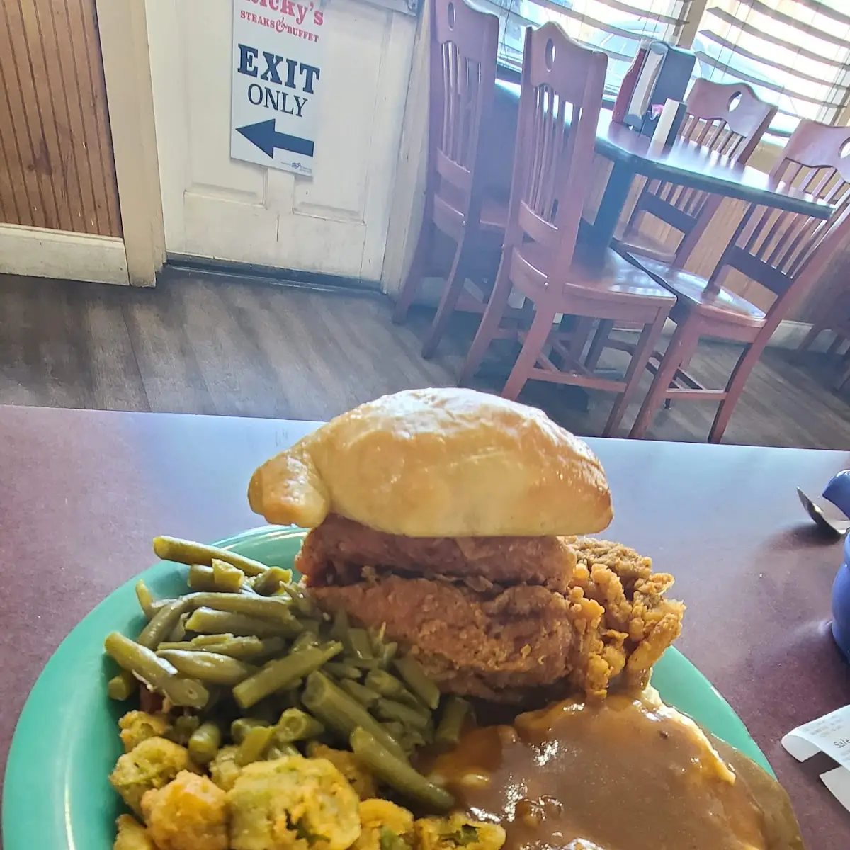 Chicken Tenders Fried Okra Green Beans Dinner Roll Mashed Potatoes and Gravy