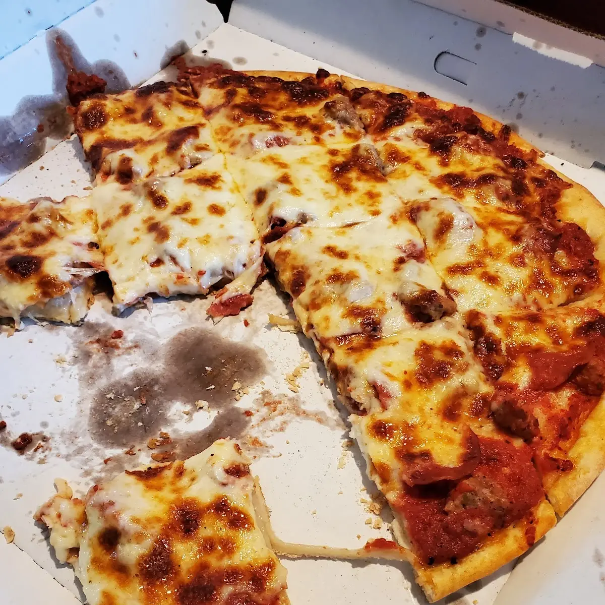 Sausage Pepperoni Extra Cheese Pizza