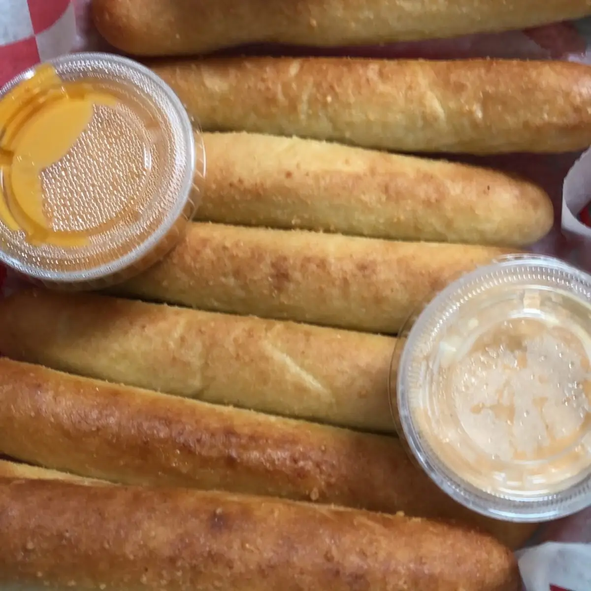 Rolyno's Special 2-Topping 5 Breadsticks & Cheese Sauce