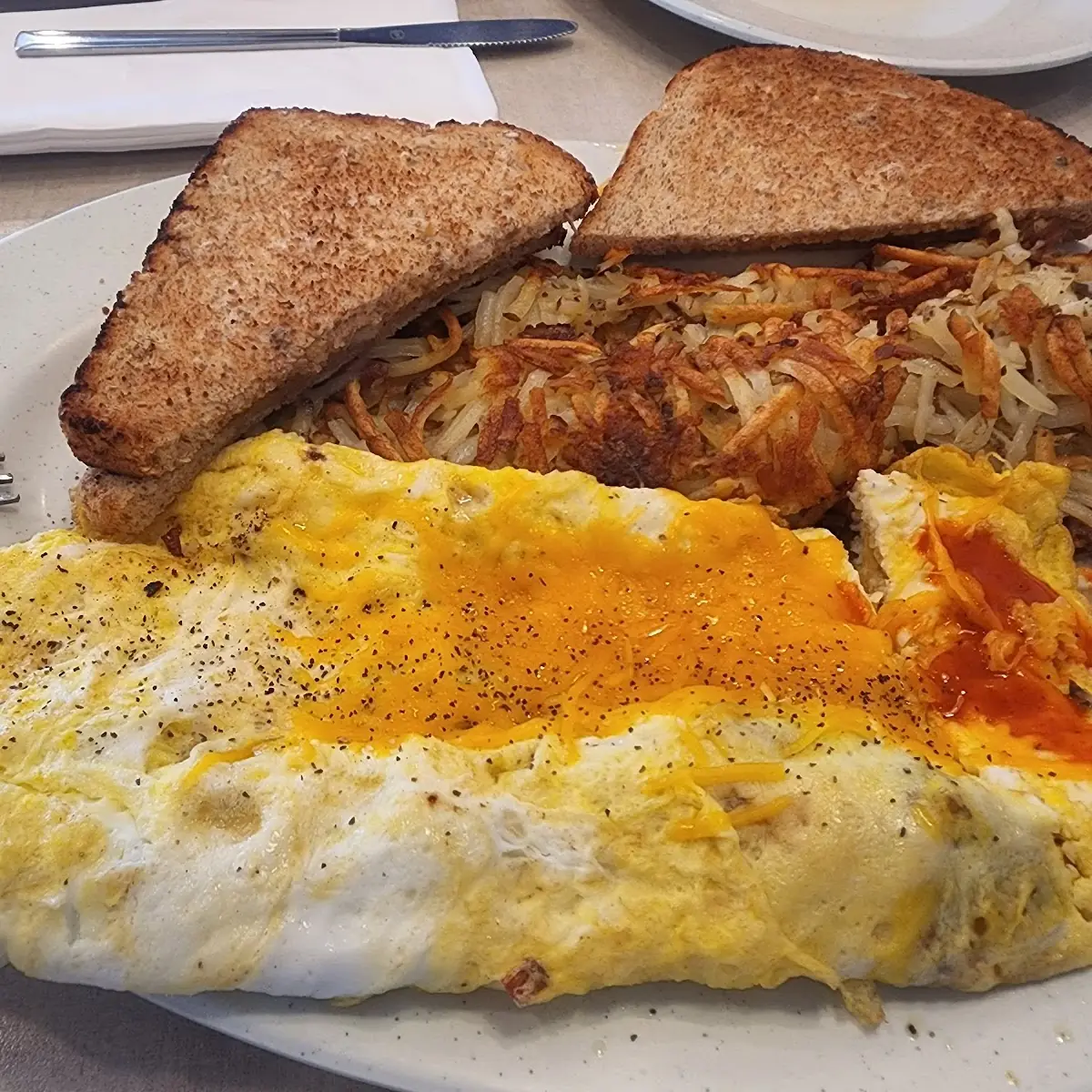 Cheese Omelet and Hash Browns
