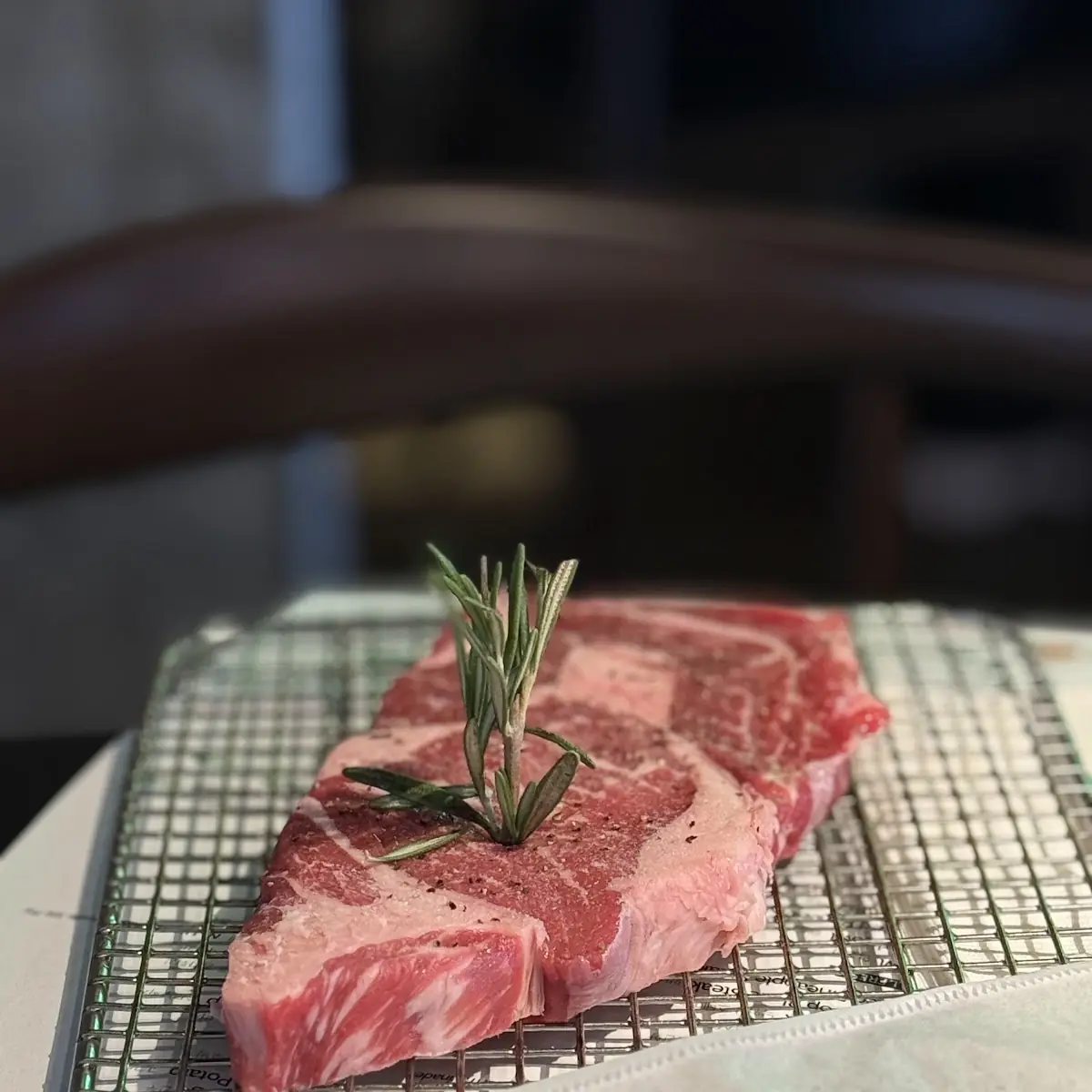 Raw Beef Steak with Rosemary