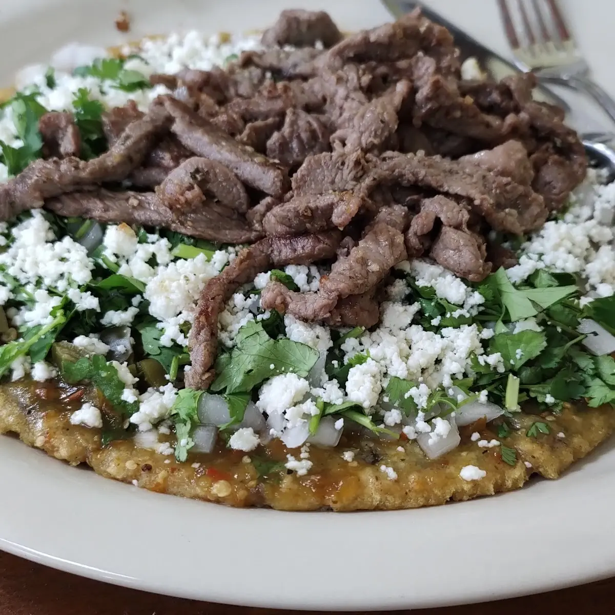 Bistec Empanizado / Breaded Steak