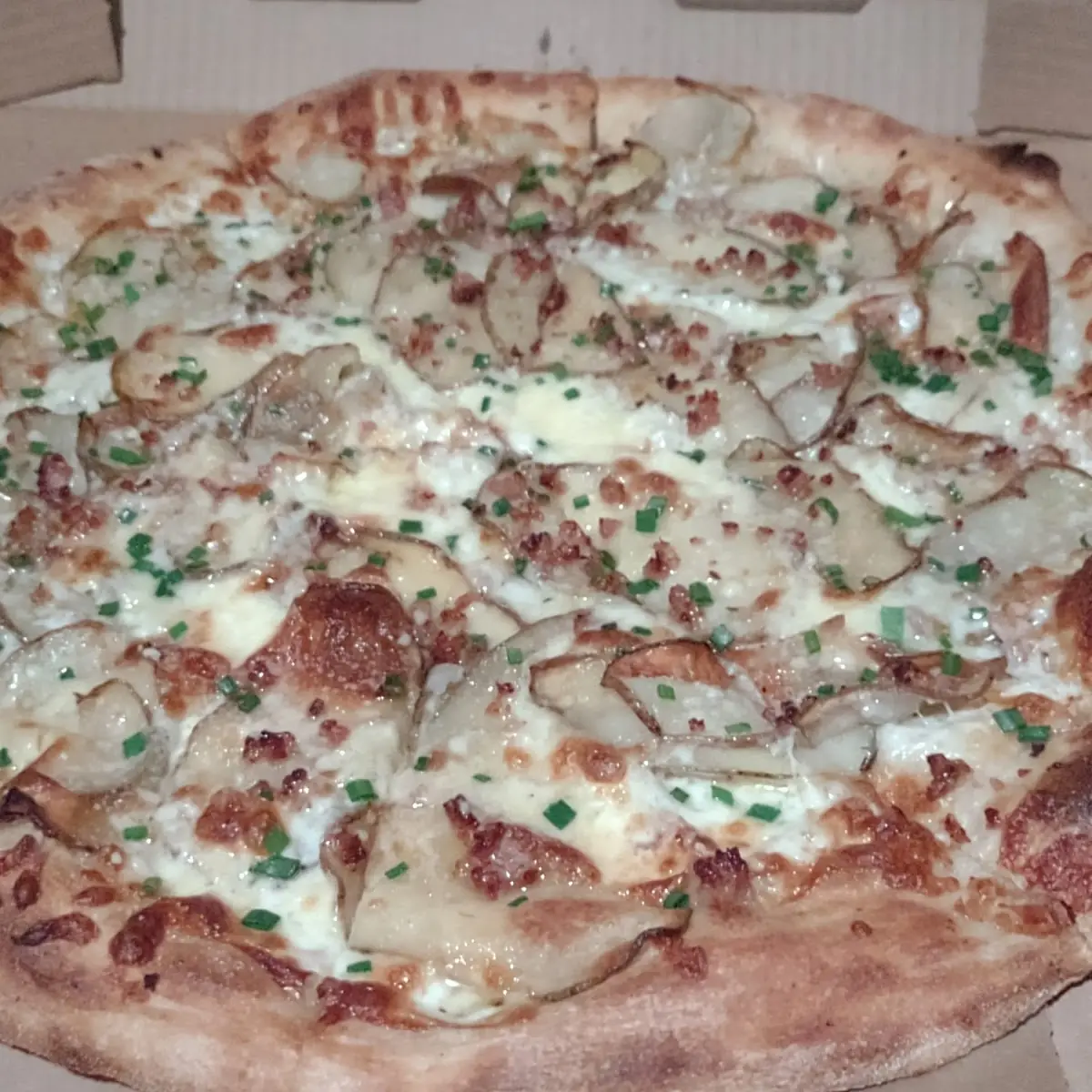 Crispy Potatoes with Extra Sausage Pizza