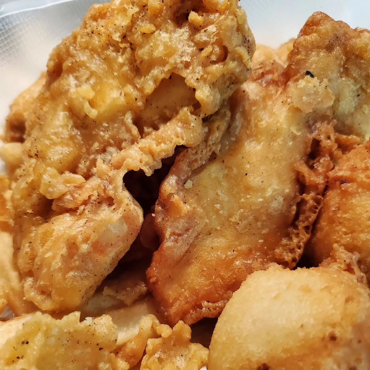 Chicken Basket Comes with 2 Batter Dipped Fried Chicken Tenders 1 Side & 2 Hushpuppies