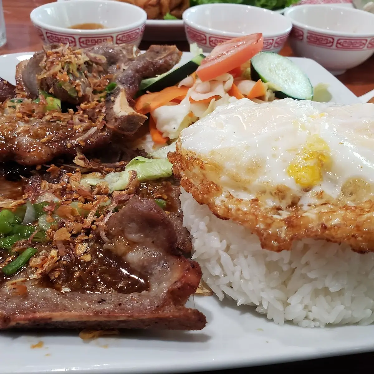 Grilled Pork Chops with Rice and Fried Egg