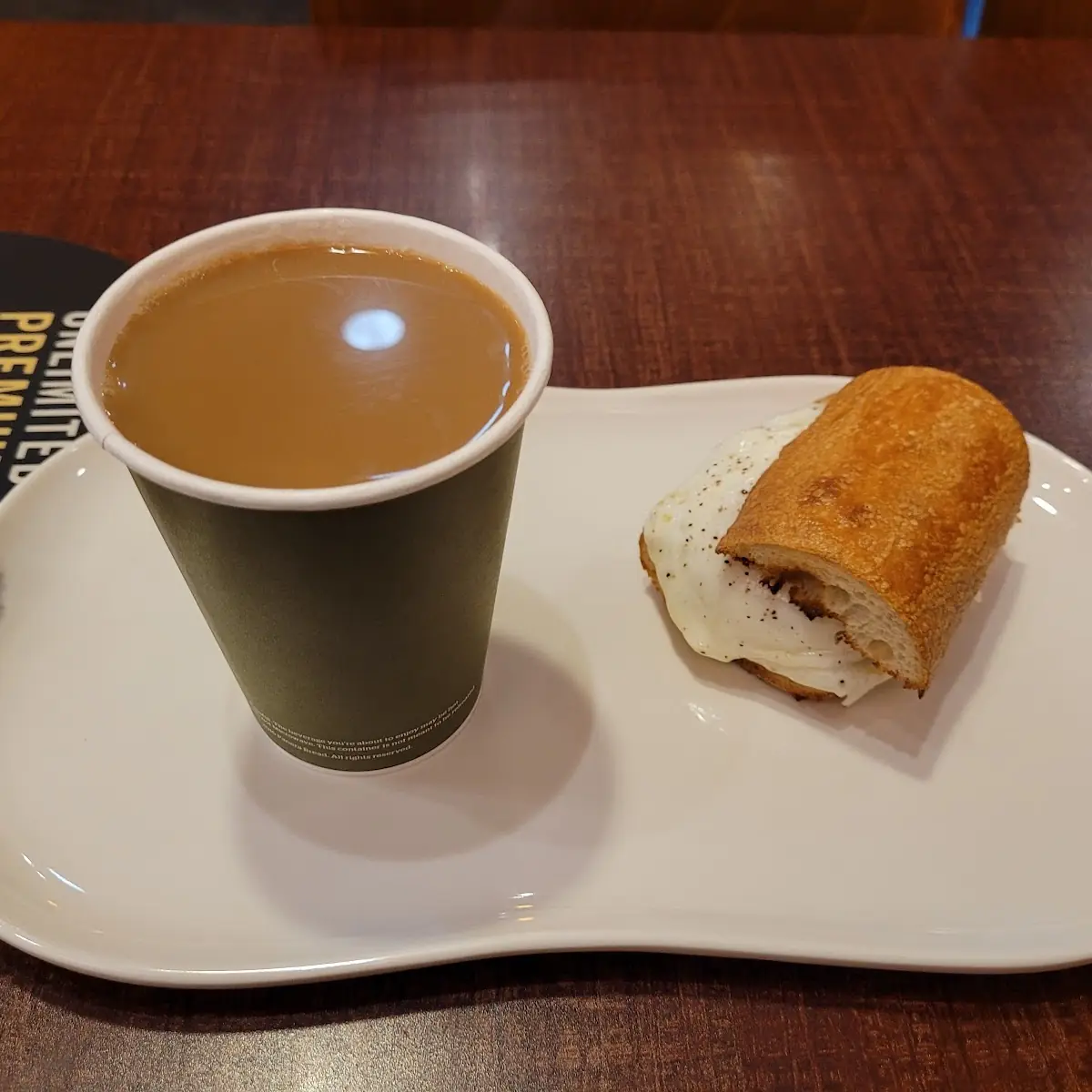 Ciabatta Breakfast Sandwich and Hazelnut Coffee