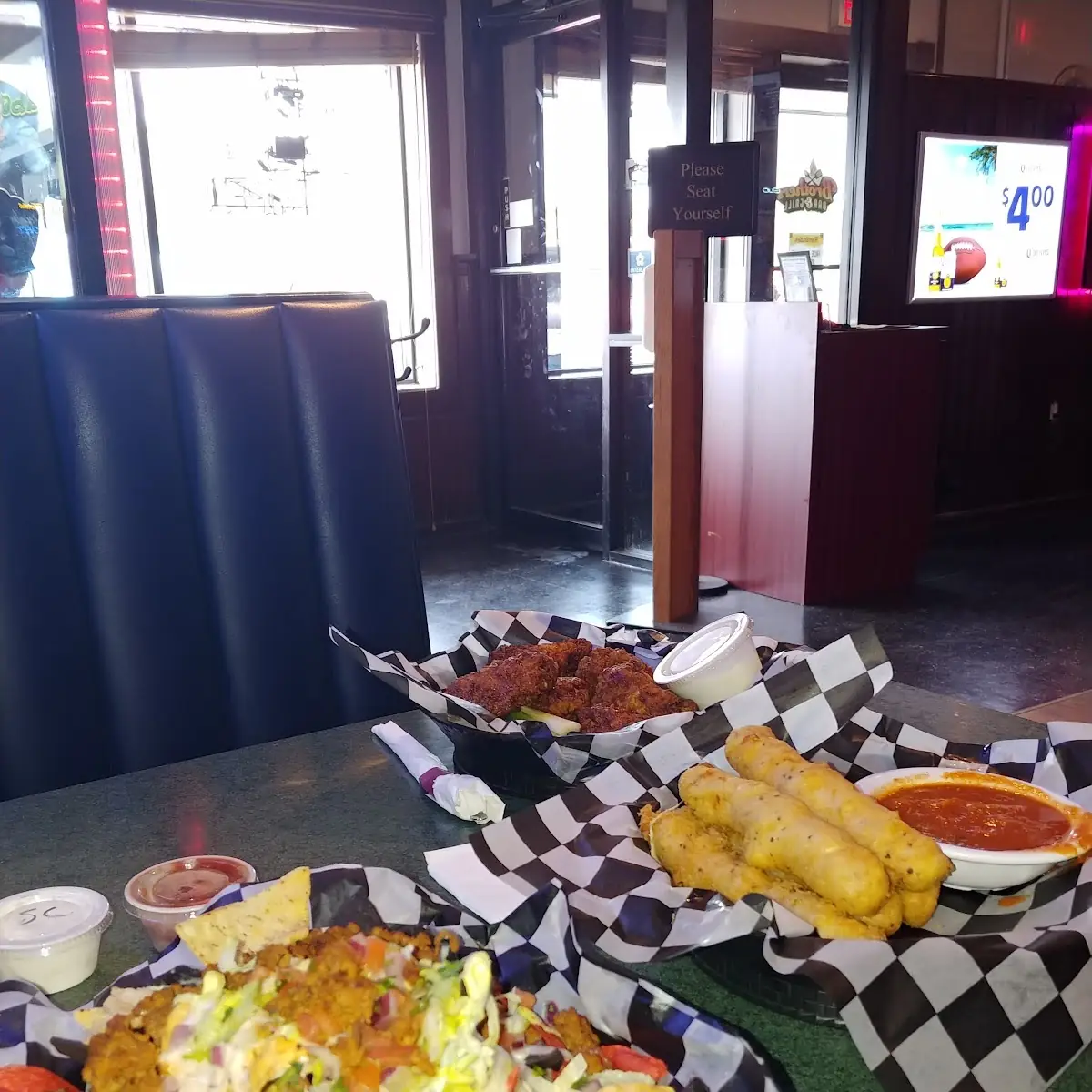 Chicken Wings Mozzarella Sticks and Nachos