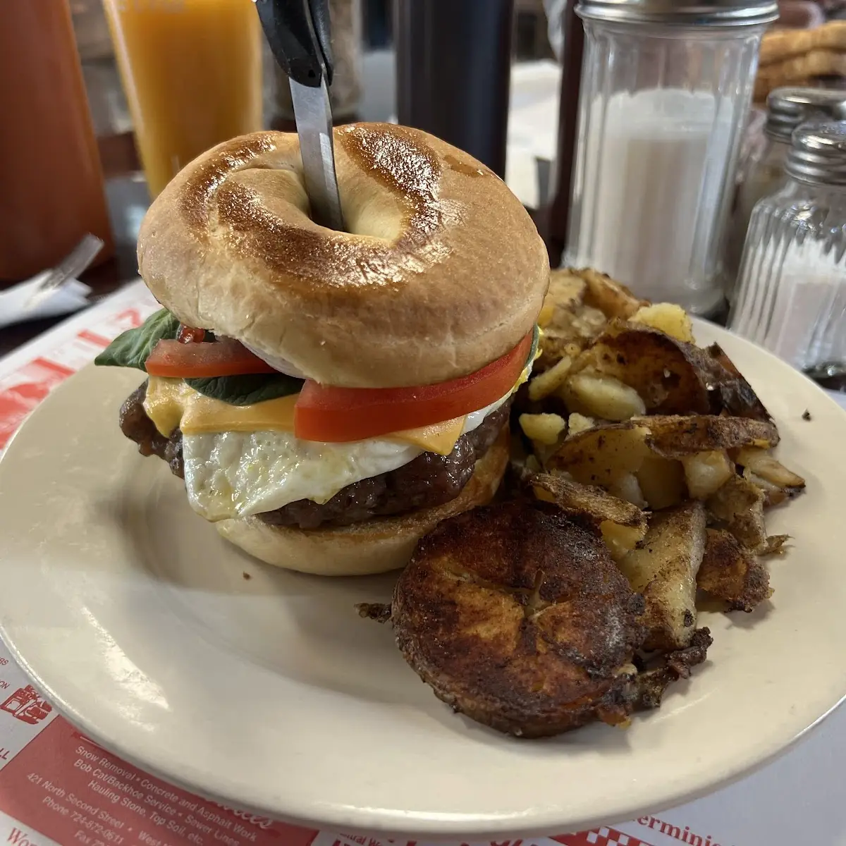 Sausage Egg & Cheese Bagel with Bacon and Homefries