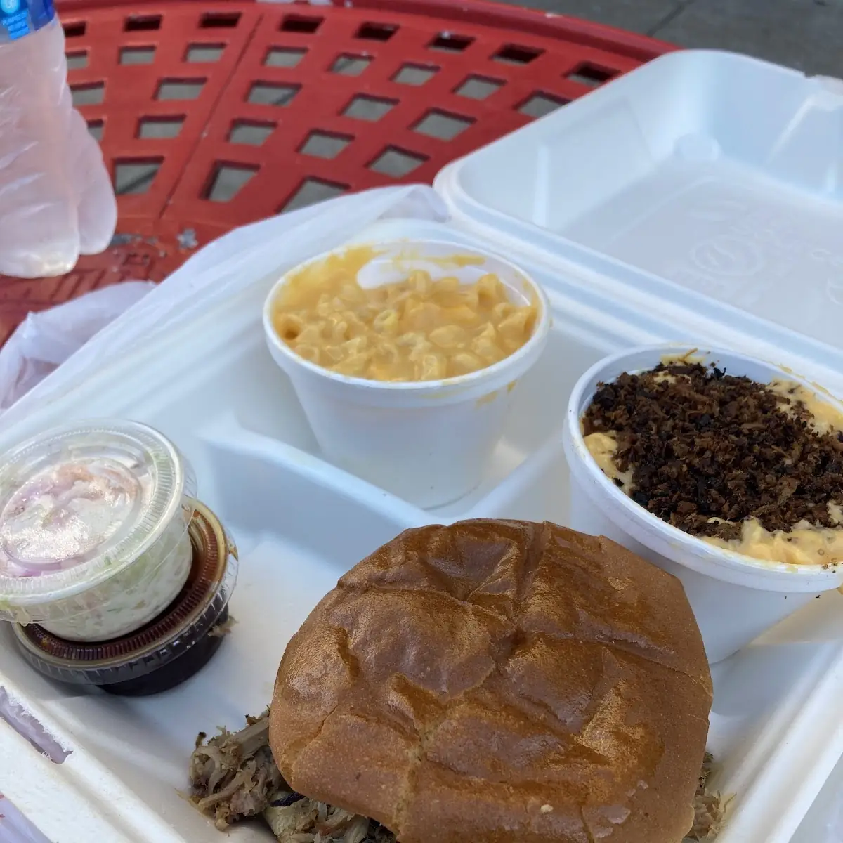 Pulled Pork Sandwich with Mac N Cheese and Coleslaw
