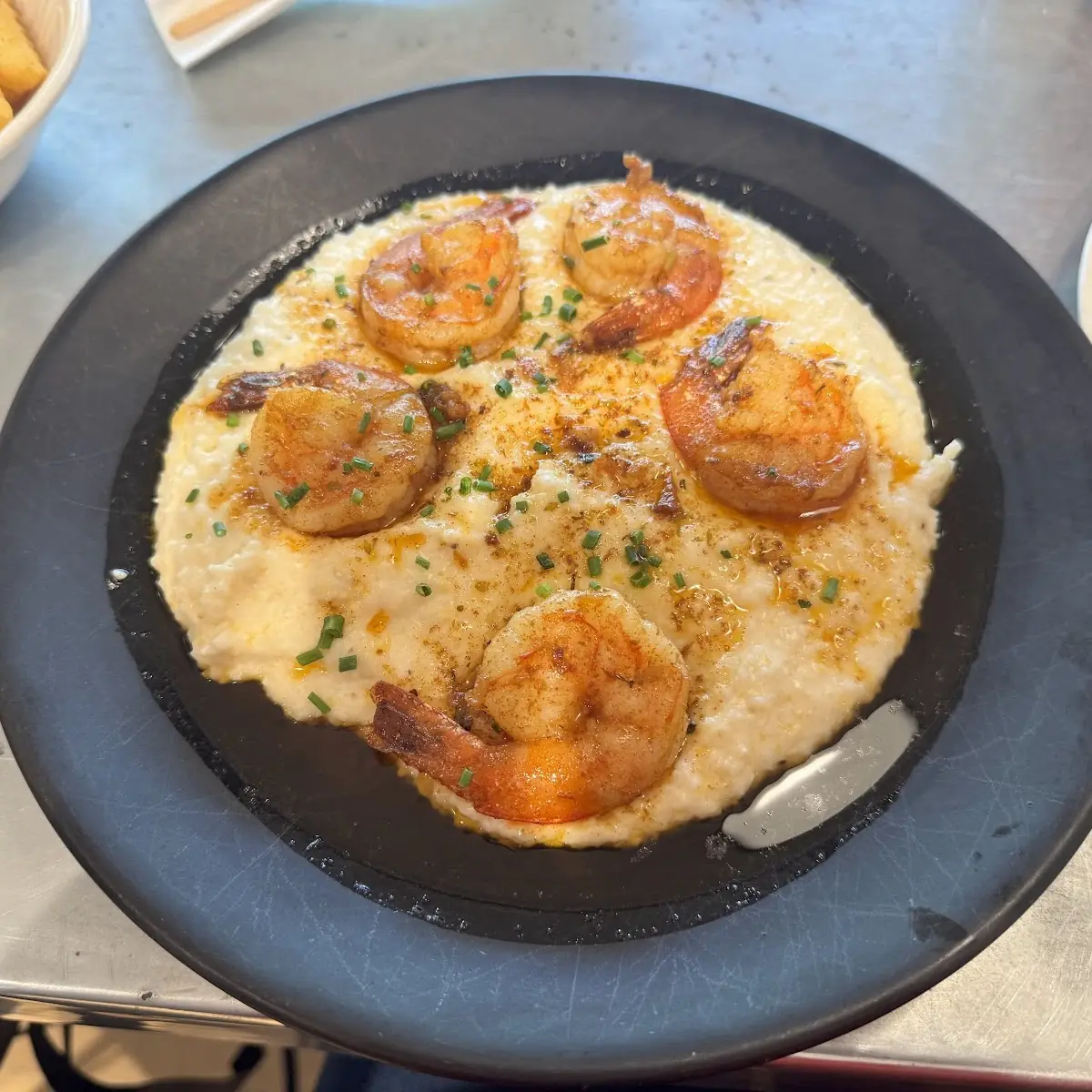 Shrimp and Grits with Scrambled Eggs and Cheese