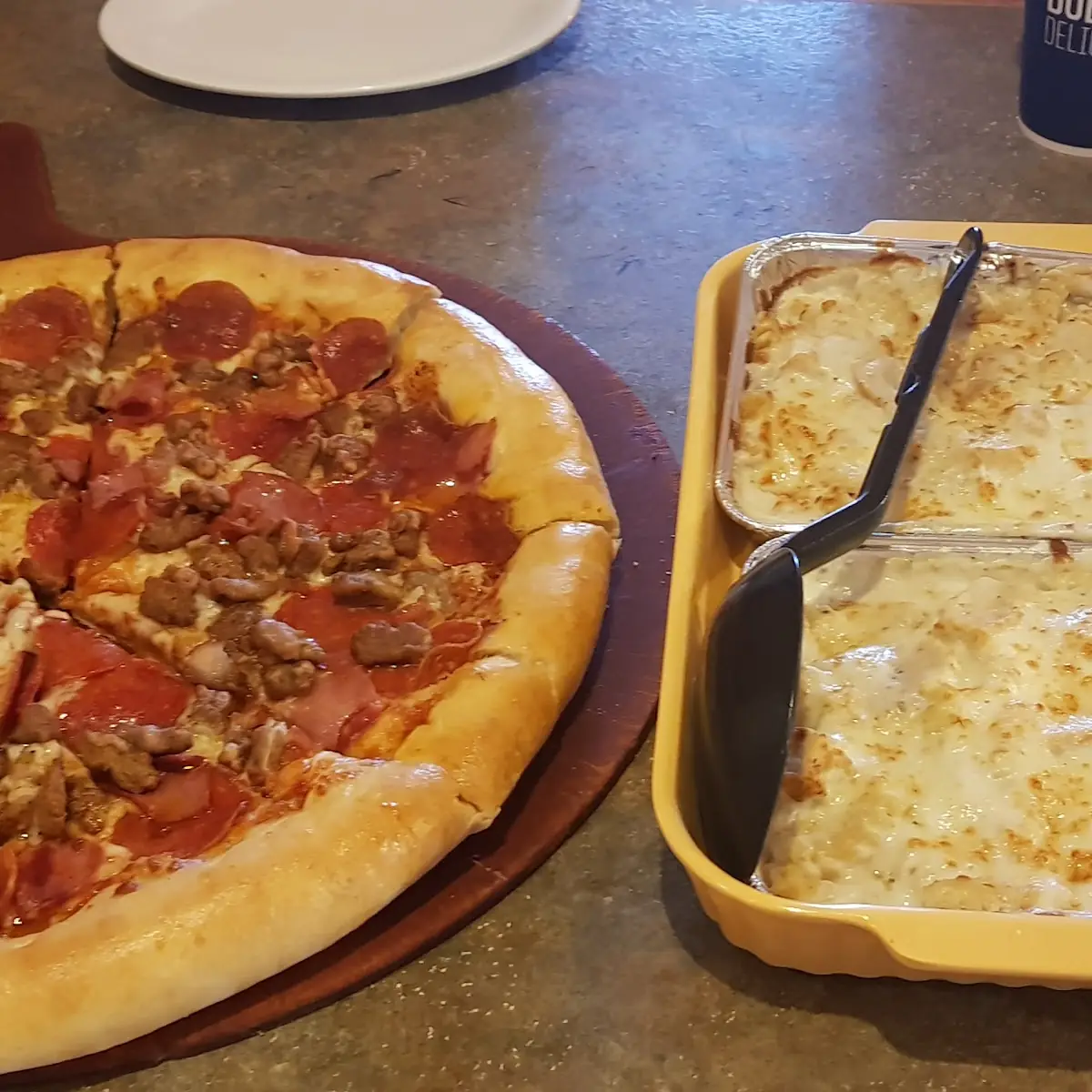 Meat Lovers Pizza and Chiken Alfredo