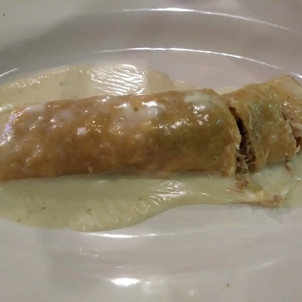 Enchilada with Cheese Sauce