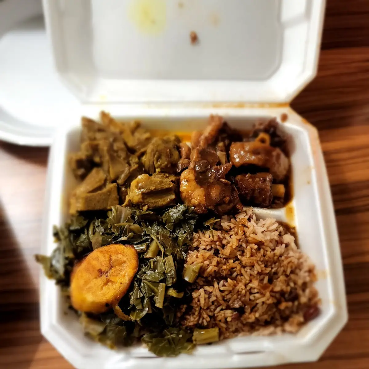 Large Oxtail Goat and Rice with Collards