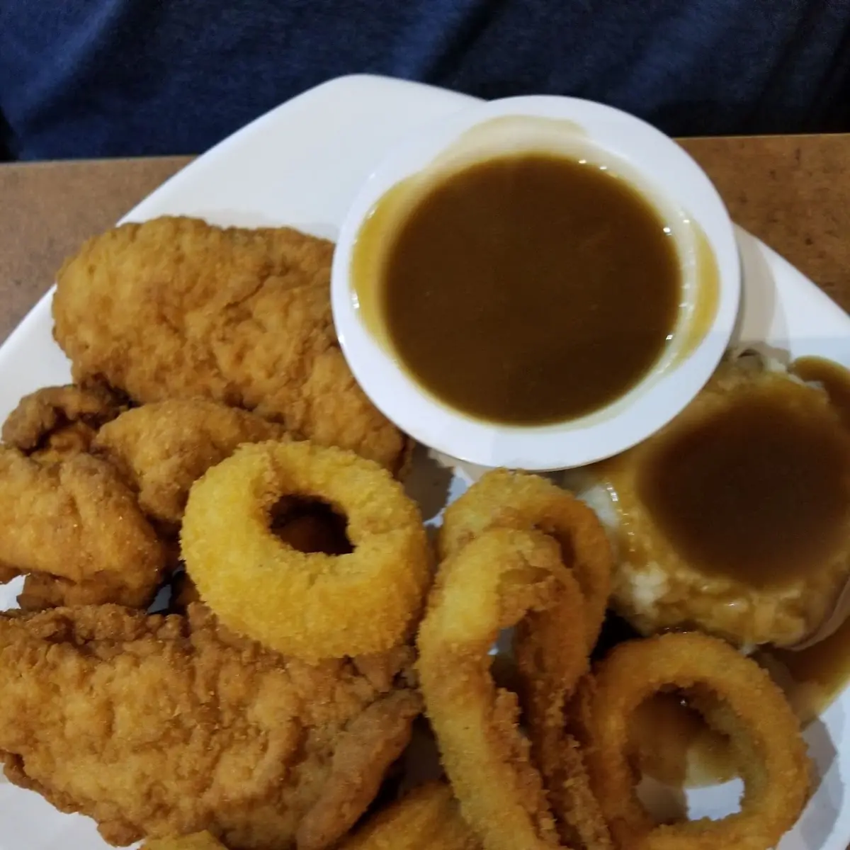Chicken Strip Dinner with Onion Rings & Mashed Potatoes and Gravy