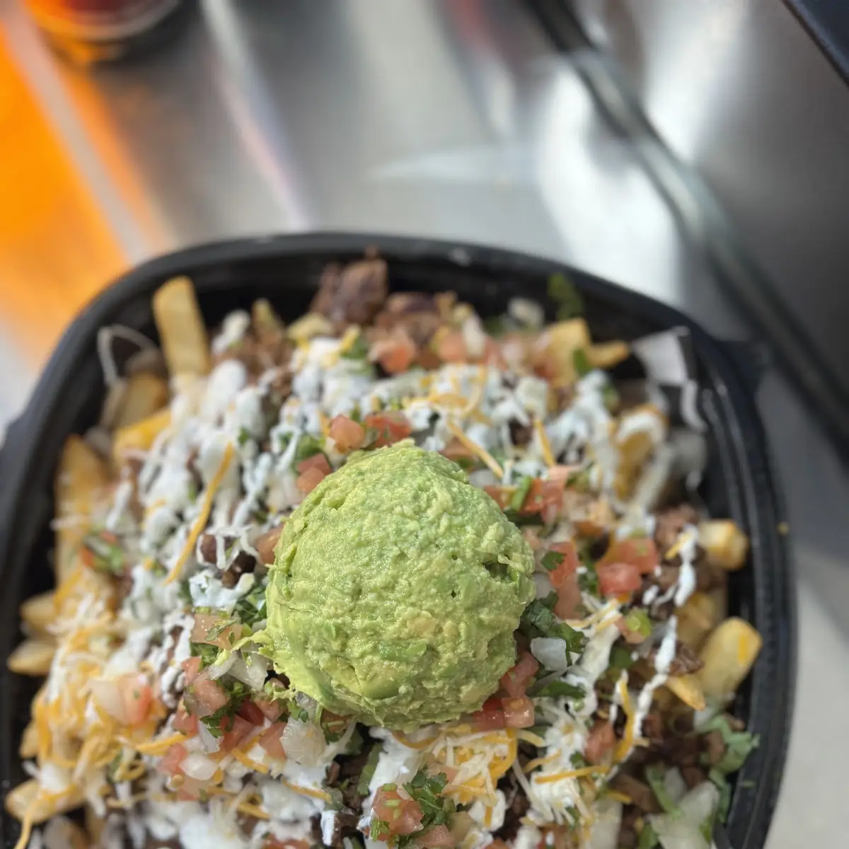 Beef Nachos with Guacamole and Sour Cream