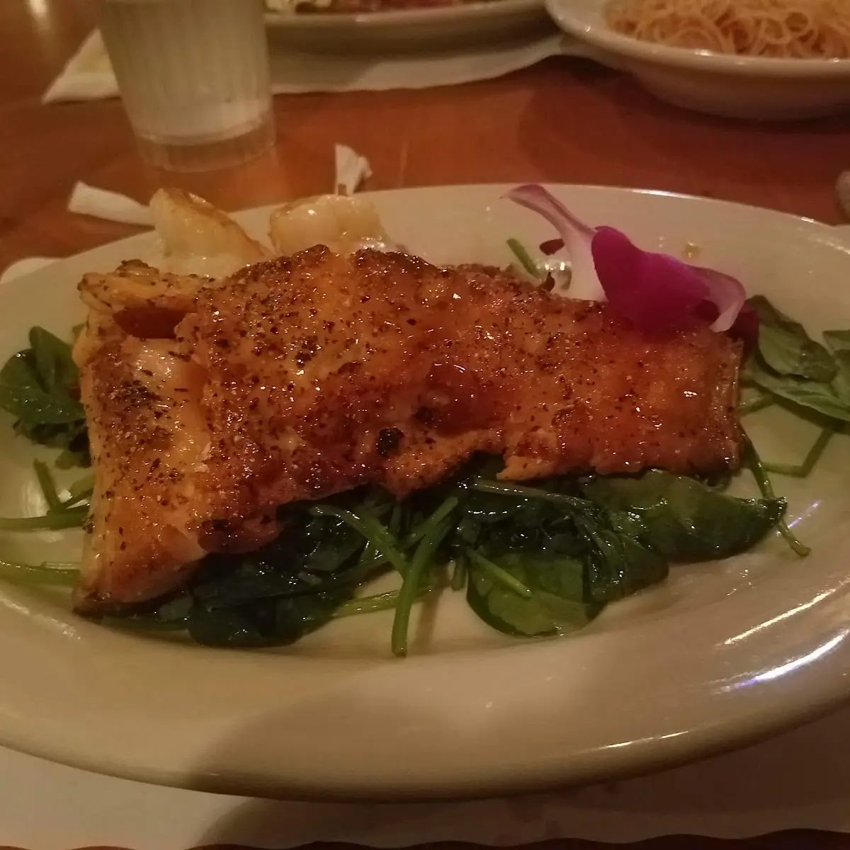 Pan Seared Salmon in a Maple Brandy Glaze over Fresh Spinach mmmm