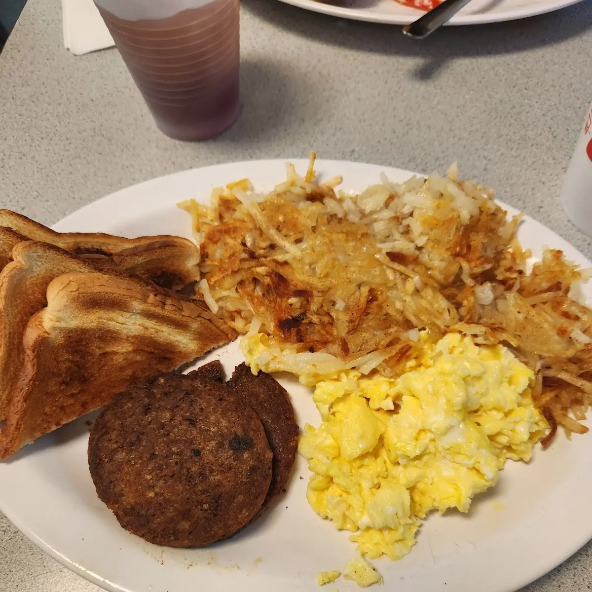 1 Two Eggs Sausage Hash Browns and Toast