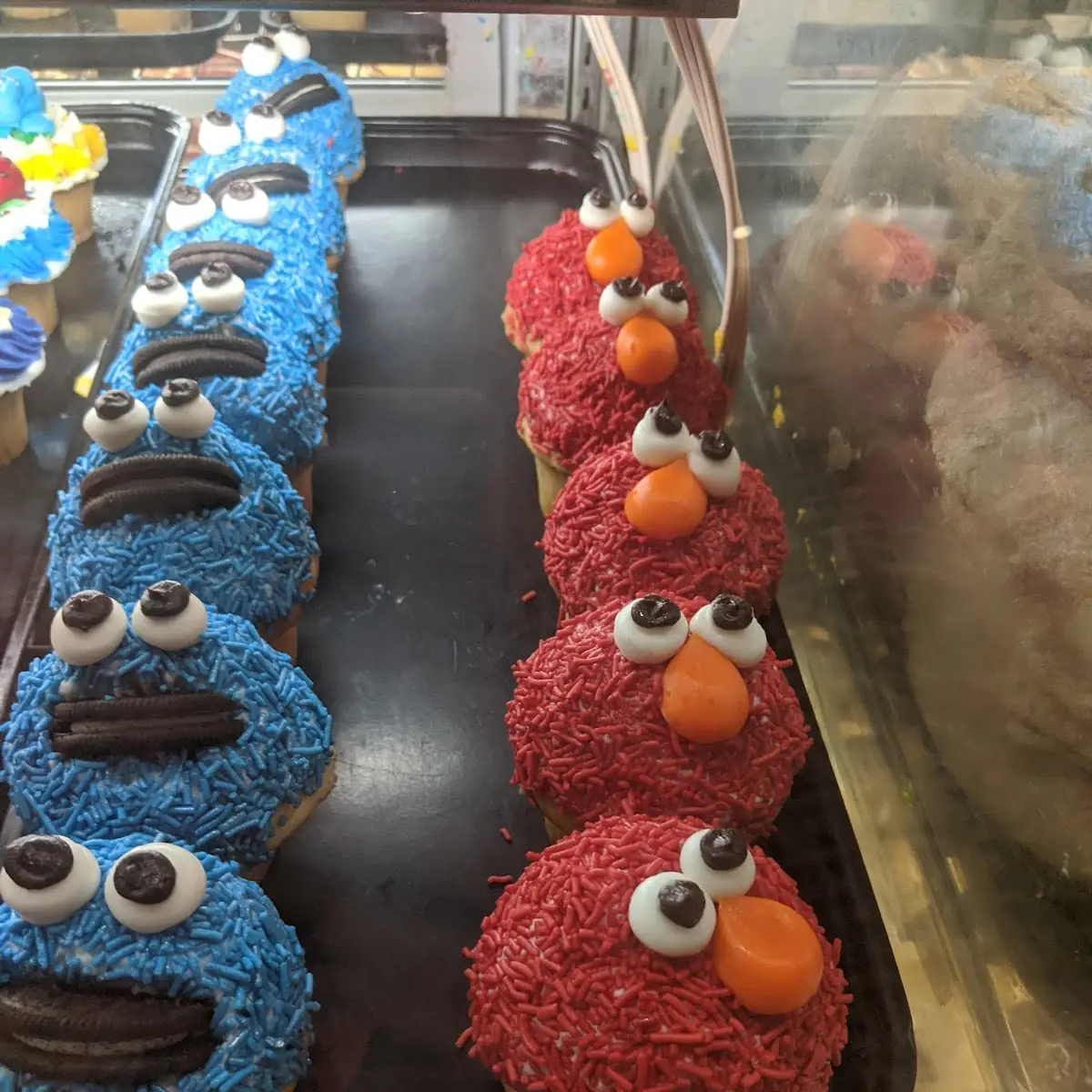 Elmo and Cookie Monster Cupcakes