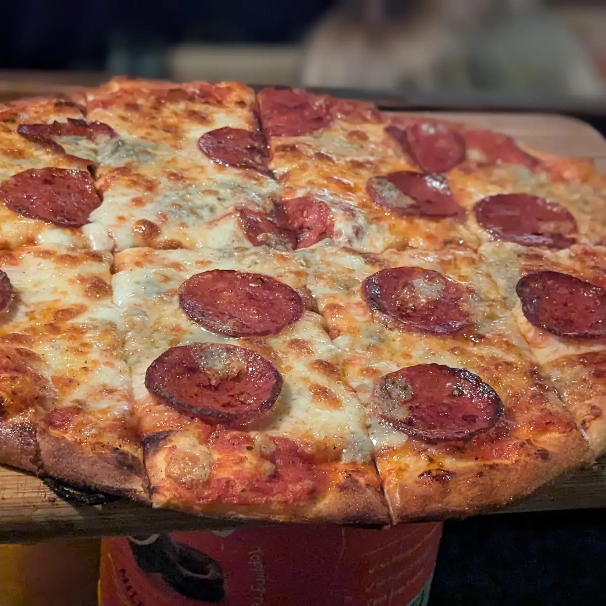 Pepperoni Pizza on Wooden Board