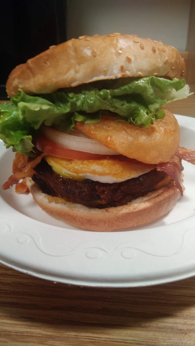 Double Cheeseburger with Bacon Onion Rings and an Egg