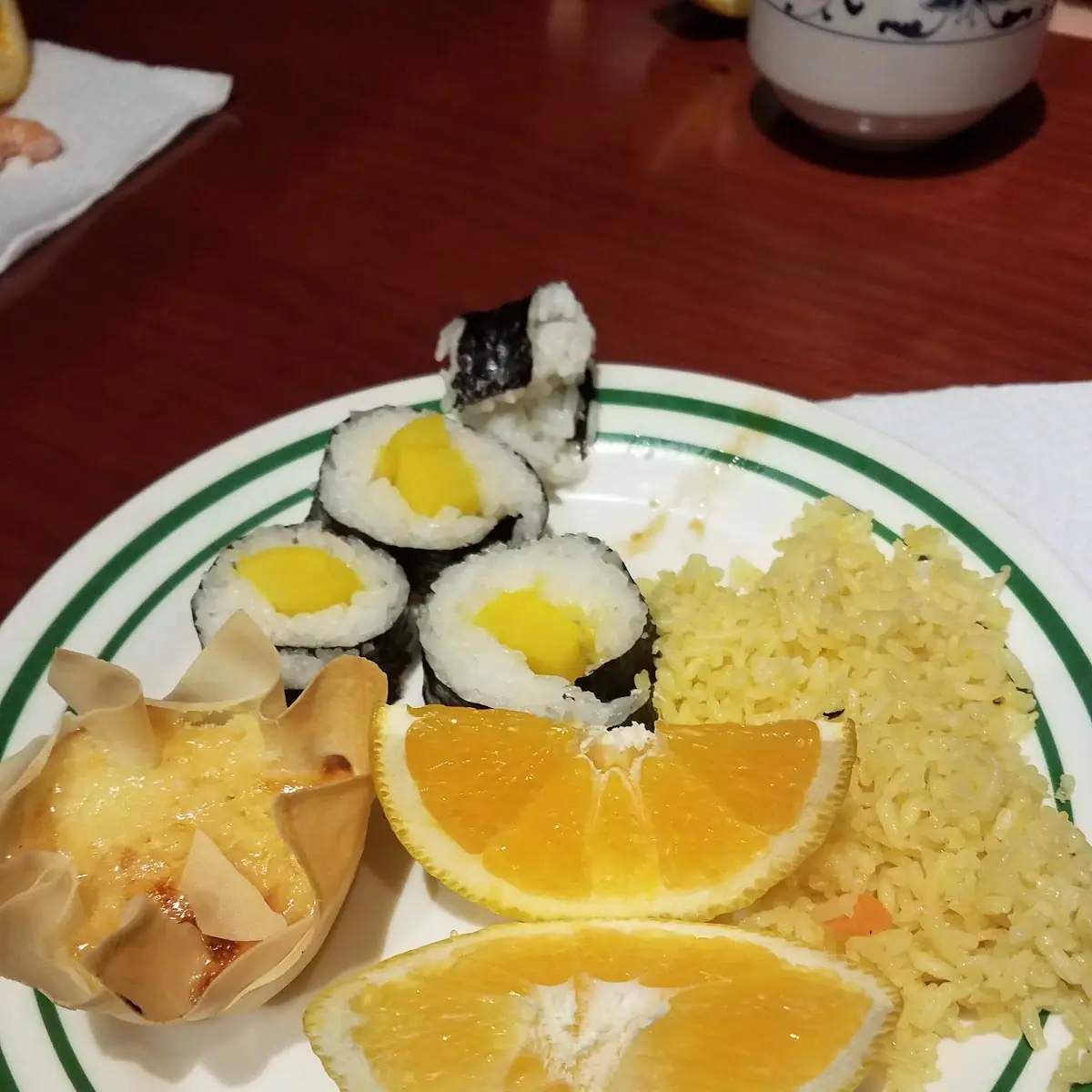 Custard with Yellow Rice and Sushi