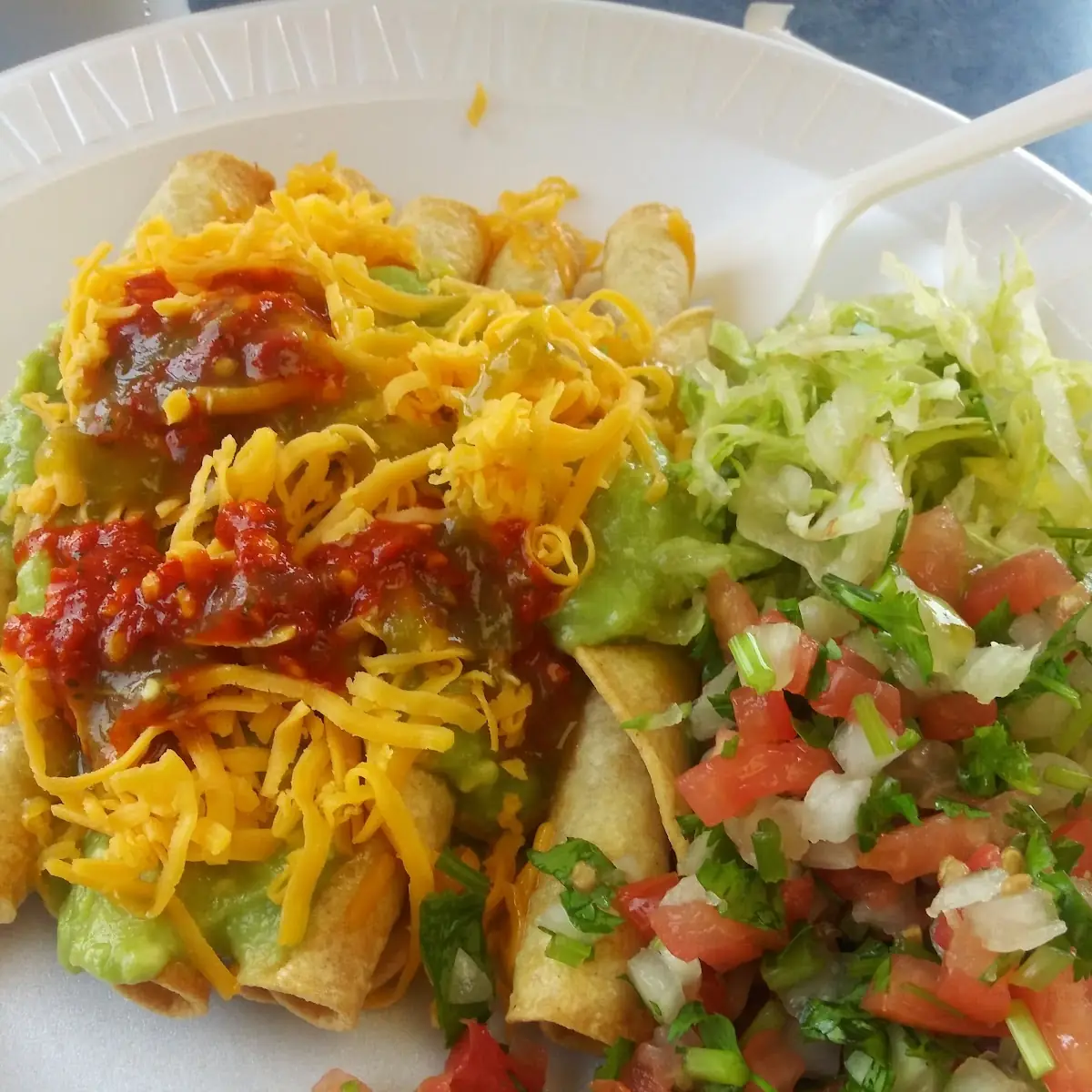 Four Rolled Tacos & Guacamole