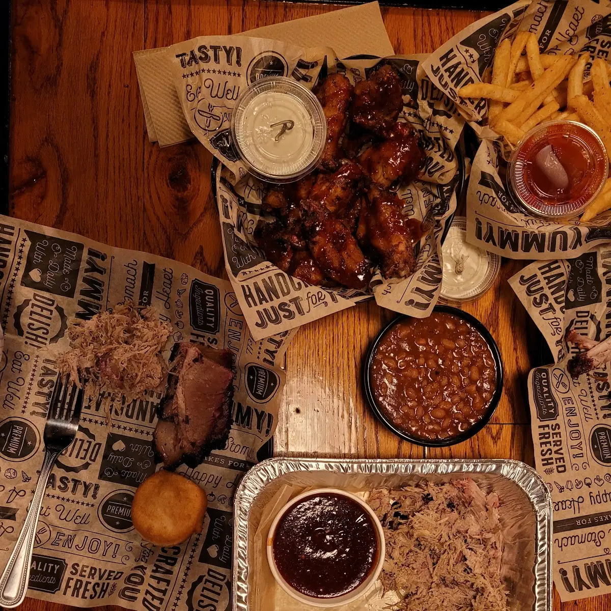 Wings Pulled Pork Brisket and Beans