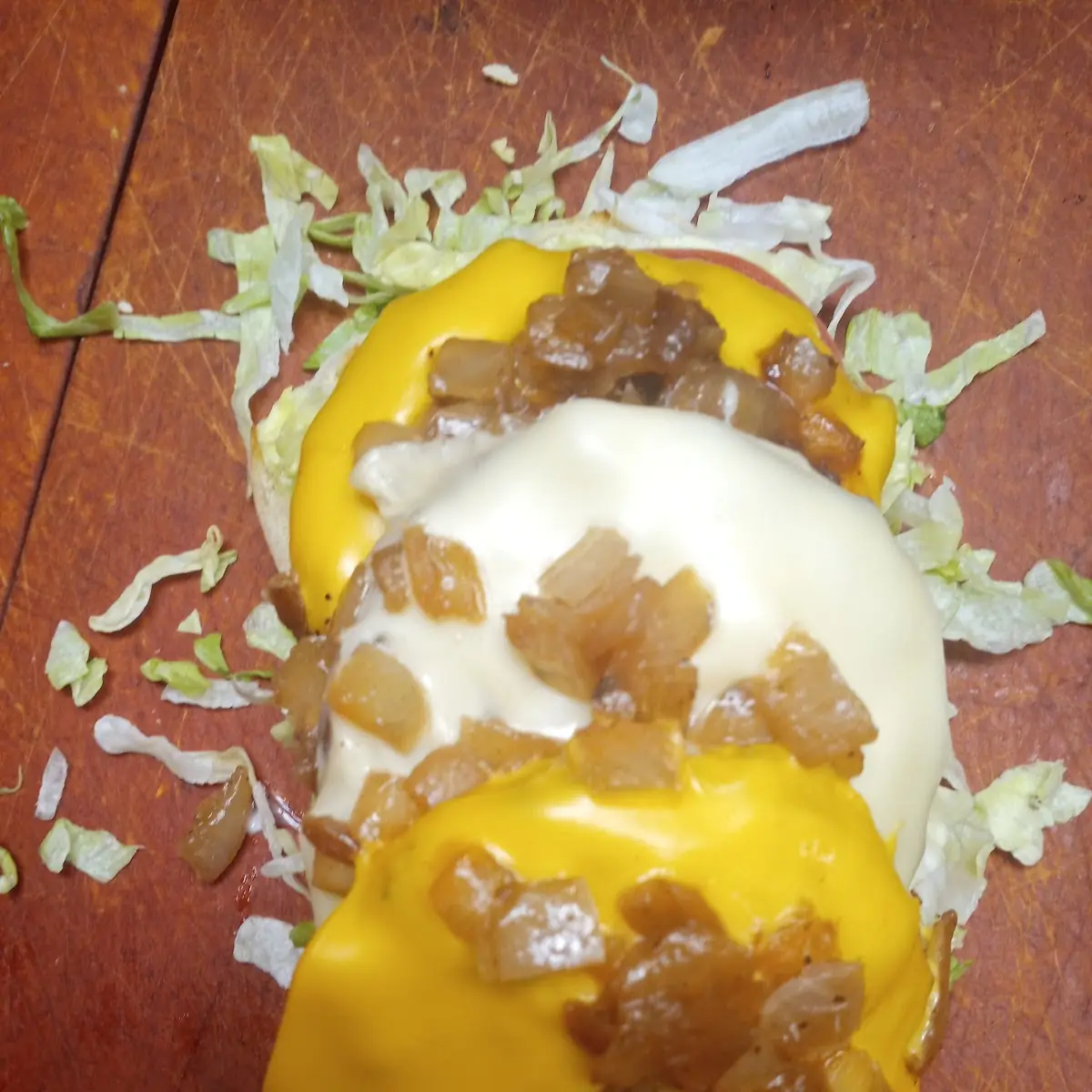 Custom-Made Triple Cheeseburger Two Cuts of Cheese