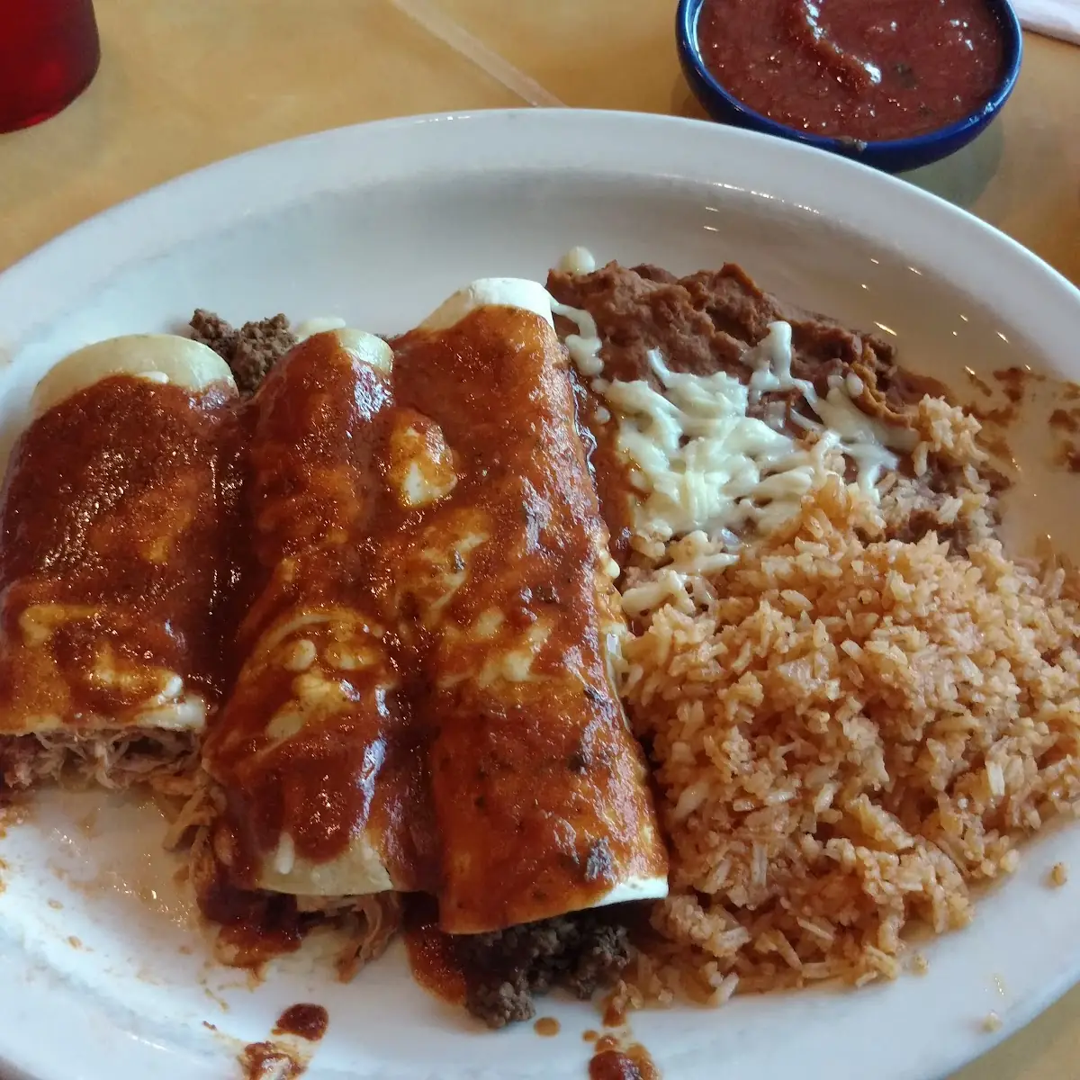 Two Chicken Enchiladas and One Beef Burrito