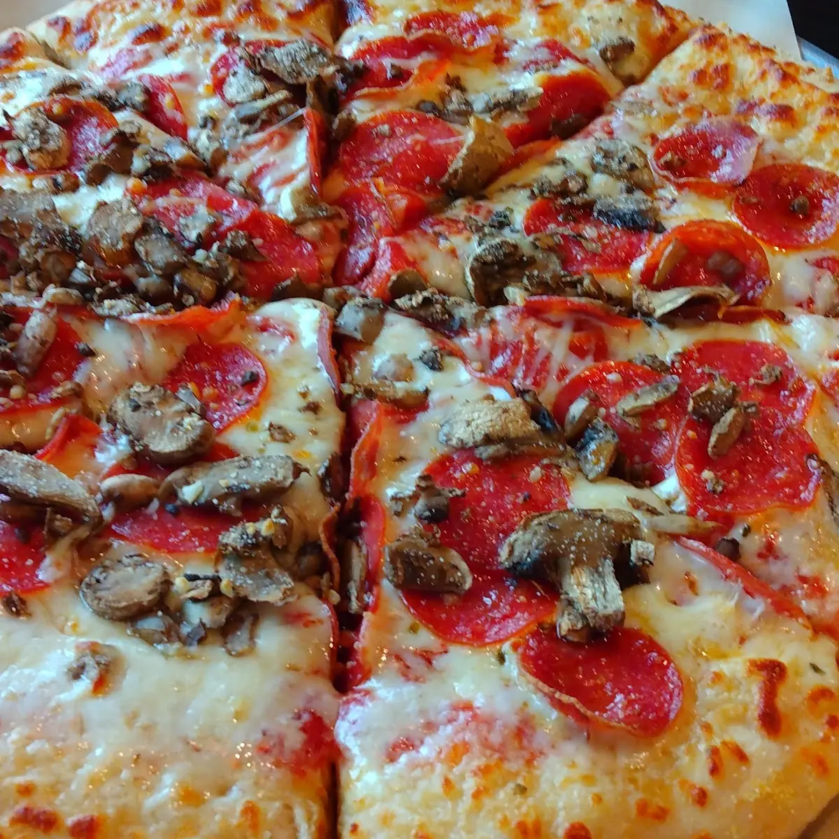 Hand-Tossed Pepperoni and Mushroom Pizza