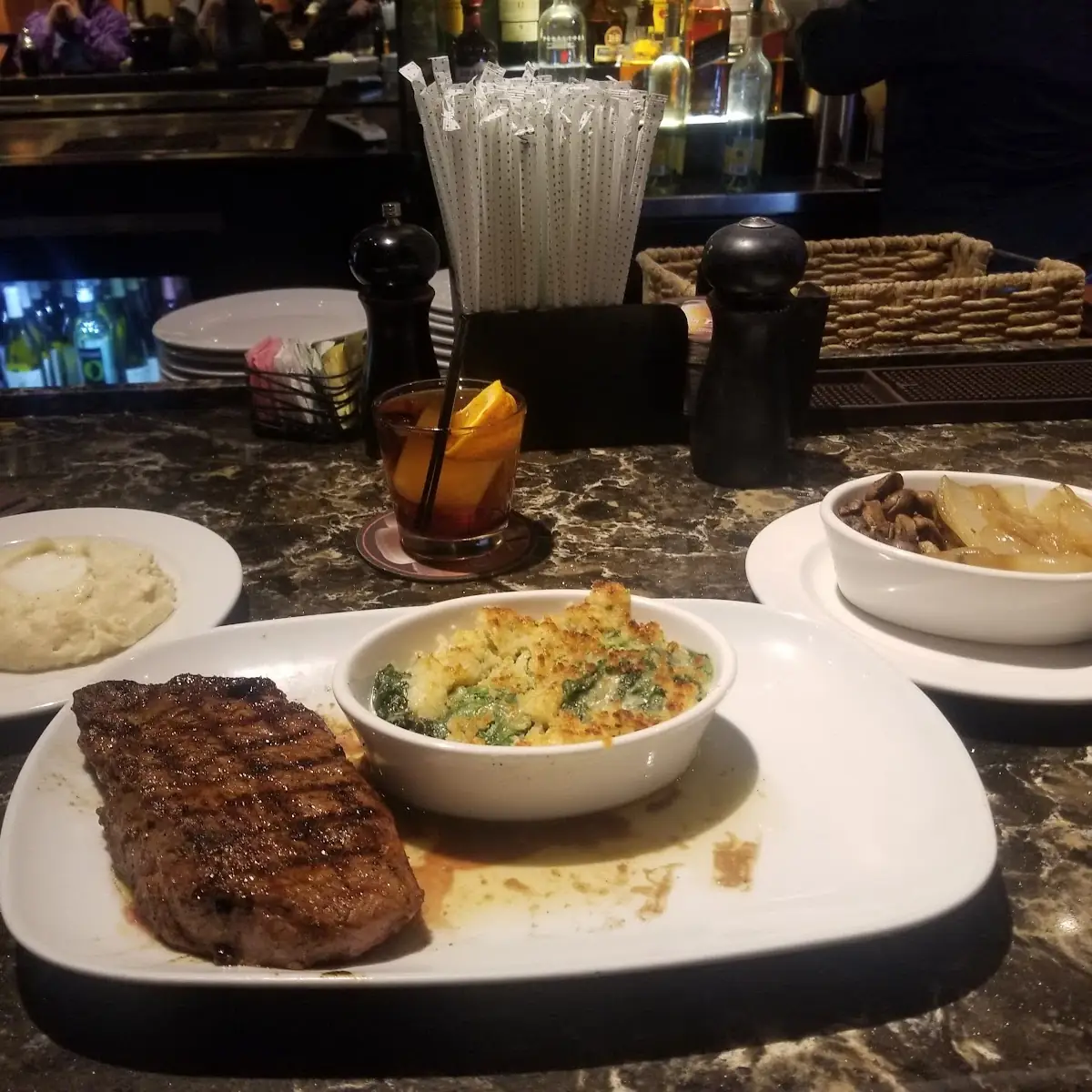 New York Strip Creamed Spinach Mashed Potatoes Fried Mushrooms and Onions Whiskey Old Fashioned Sour