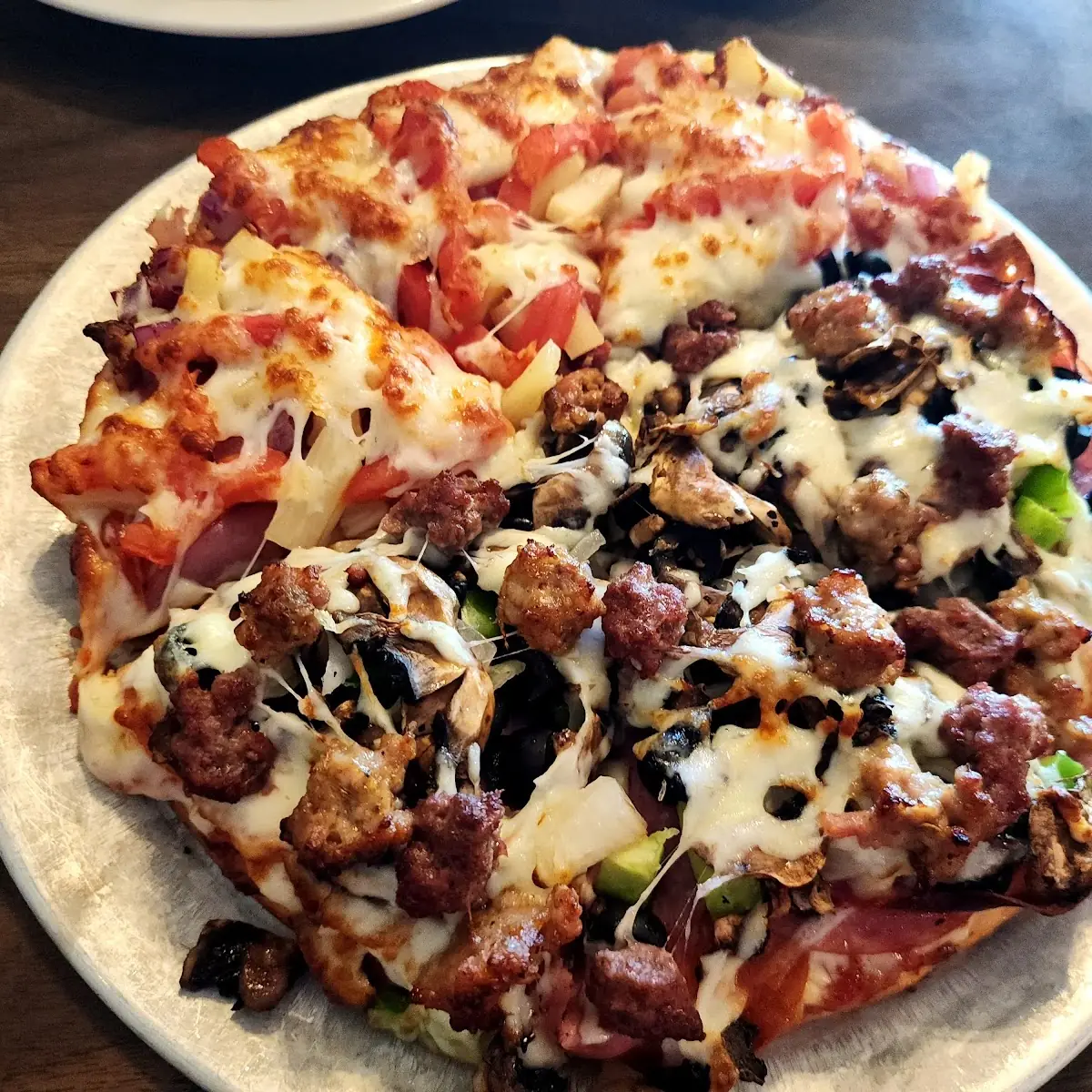 Half Maui Wowie and Half Combination Pizza