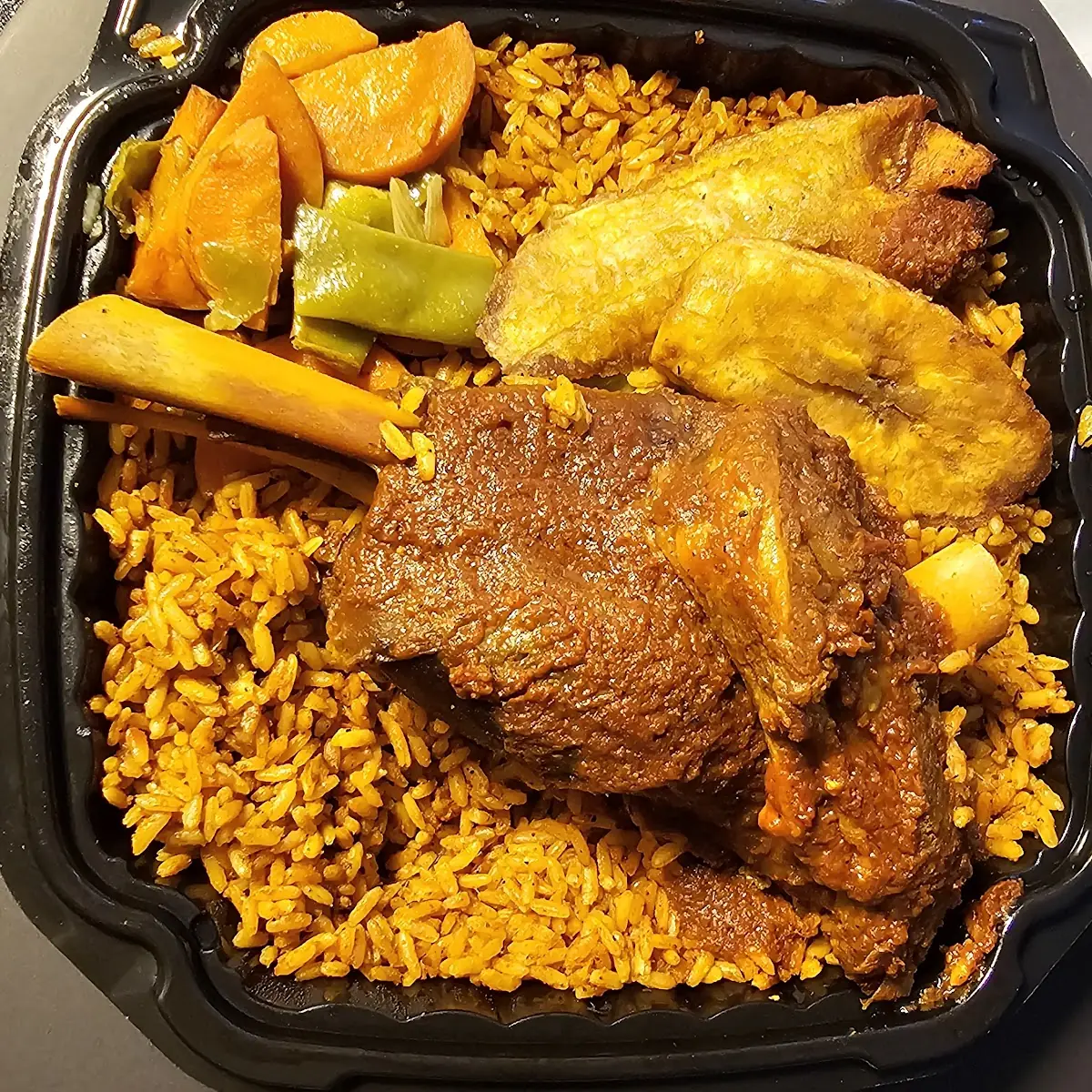 Jollof Rice Meal with Lamb Shank