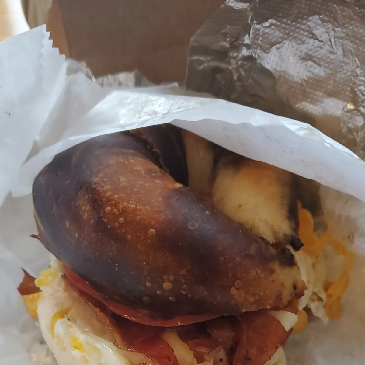 Marble Bagel with Bacon Egg Cheddar Cheese with Tomato