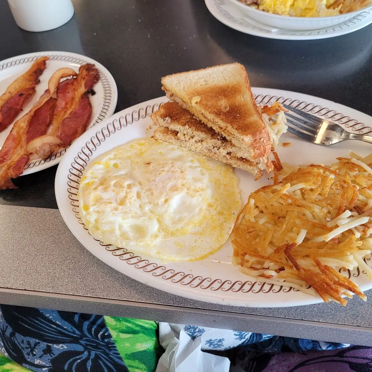 Eggs Overeasy with Hash Browns Bacon & Toast