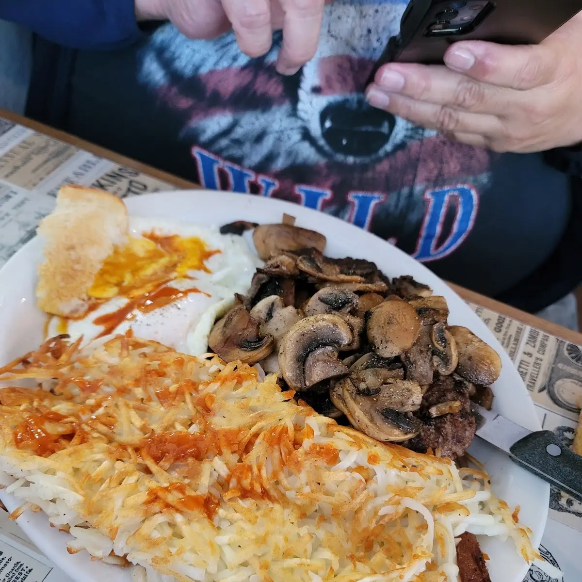 Hamburger Steak and Eggs with Hash Browns Breakfast