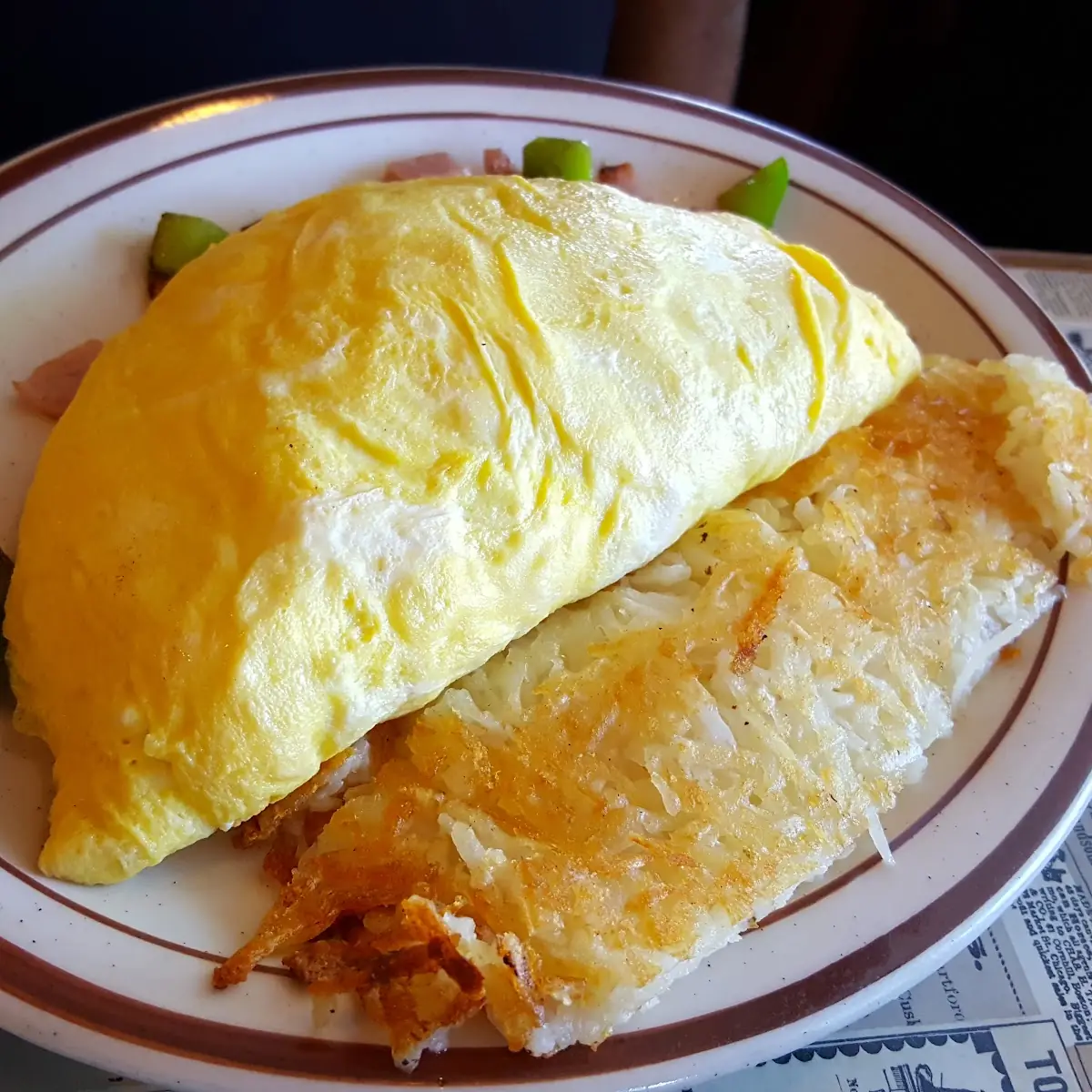 Pastrami and Swiss Omelet with Hash Browns