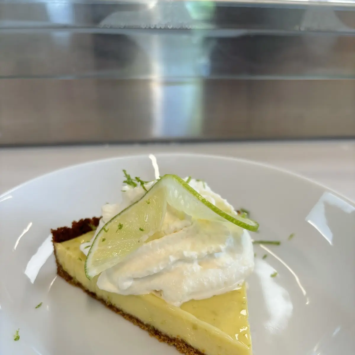 Key Lime Pie Slice with Whipped Cream