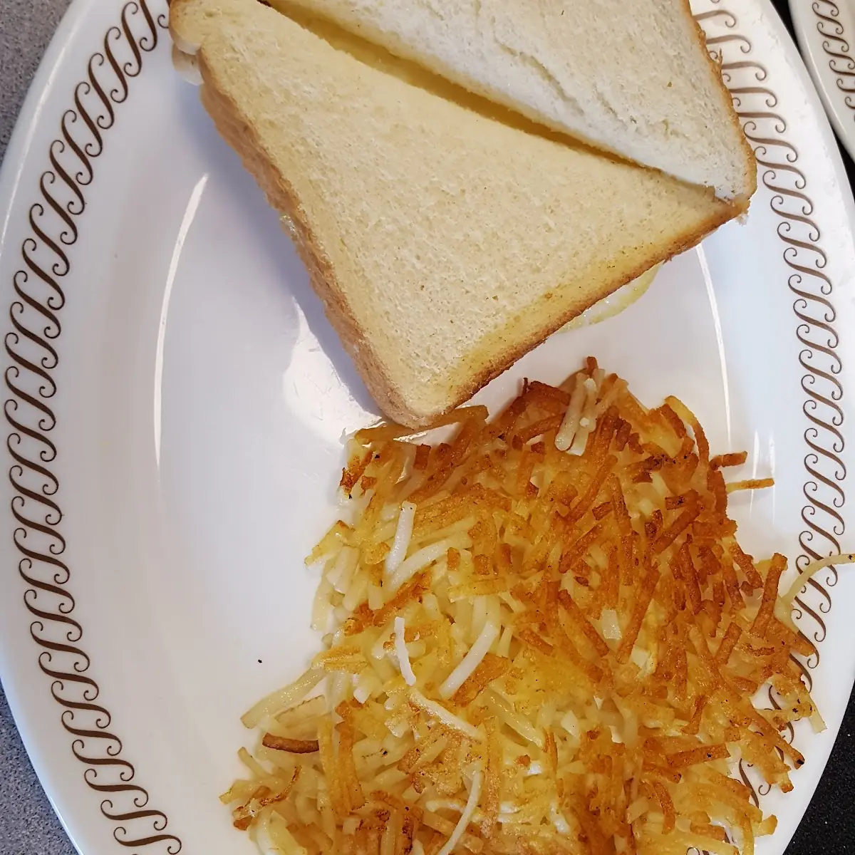 Egg & Cheese Sandwich with Scattered Hash Browns