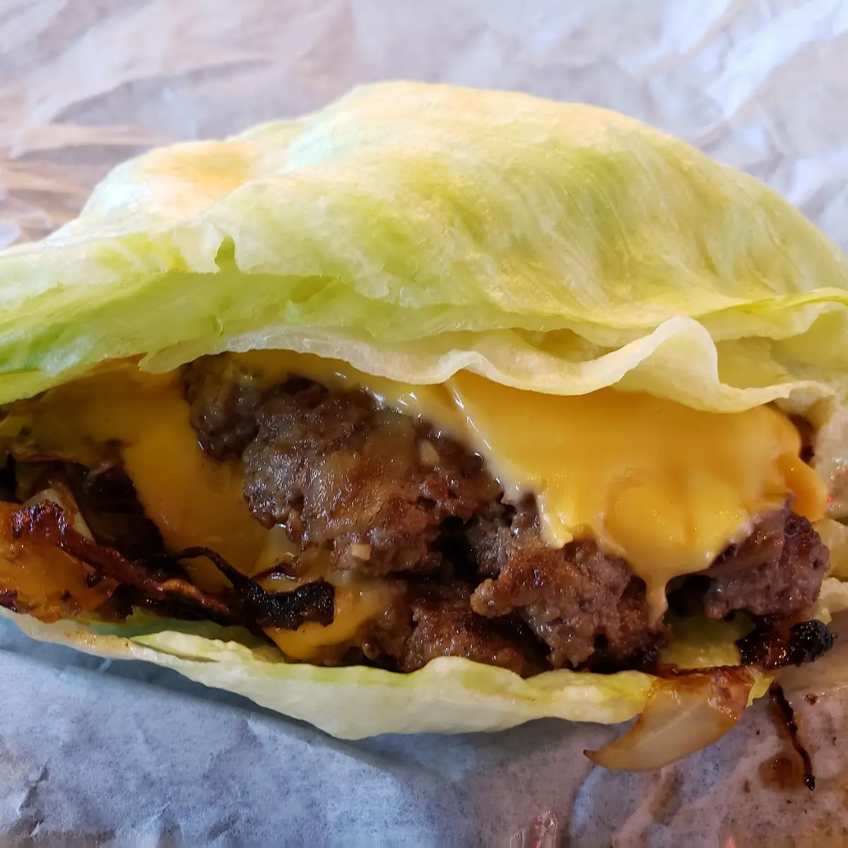 Lettuce Wrapped Double Cheeseburger with Grilled Onions and Jalapenos