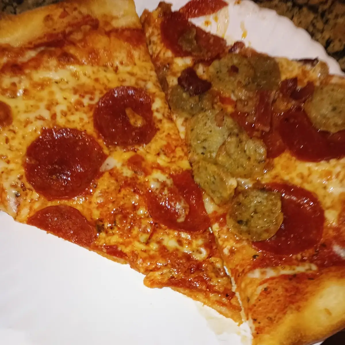 Pepperoni and Sausage Pizza Slice