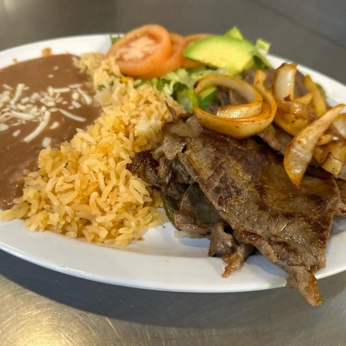 Bistec Encebollado Steak & Onions