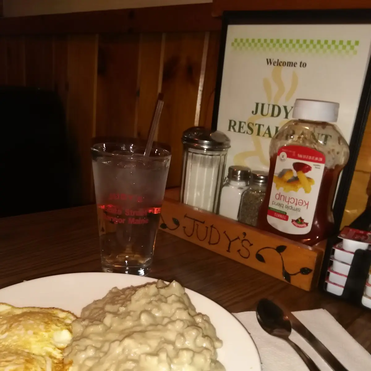 Eggs over-Easy with Sausage Gravy over Biscuits