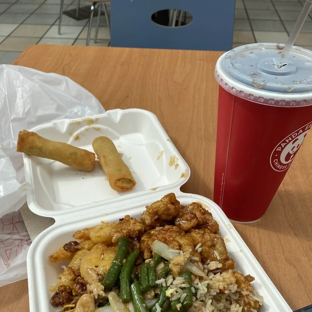 Nodels with Orange Chicken Coconut Shrimp and Rolls