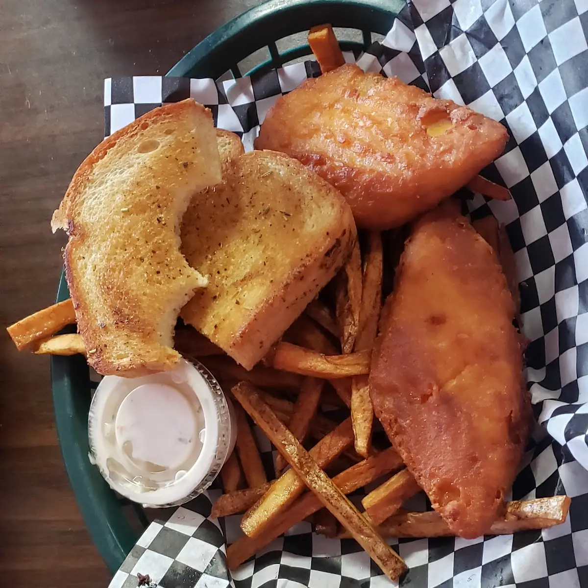 Fish and Chips Served with Garlic Bread