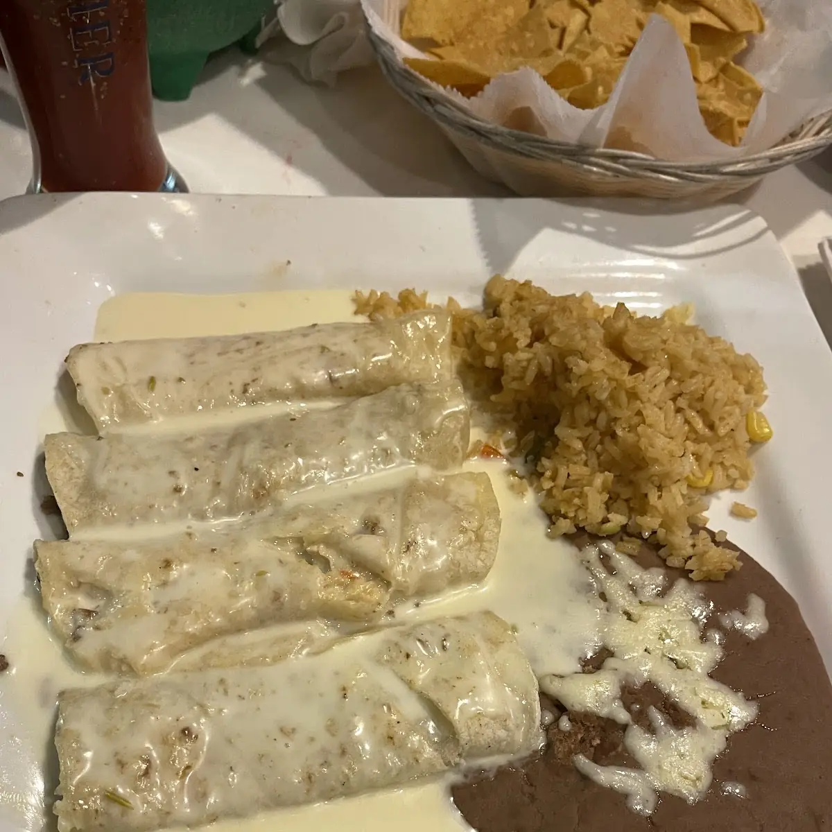Ribs Smothered with Chile Verde with Rice Beans Salad and 2 Tortillas